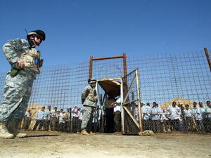 US soldiers guard the notorious Abu Ghraib prison as detainees are released (Getty Images)
