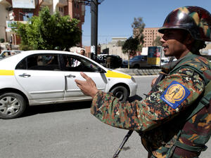 A Yemeni soldier mans a checkpoint in Sanaa on Wednesday as authorities stepped up security measures ahead of an extraordinary UN Security Council session in Yemen on Sunday. (AFP Photo/Mohammed Huwais)
