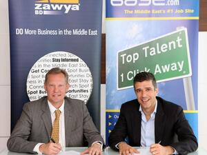 Gunnar Skoog, CEO, Zawya and Rabea Ataya, CEO of Bayt.com during the signing