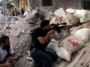 متمردون مسلحون يتخذون موقعا لهم في حي صلاح الدين في حلب 
