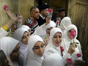 الفتيات المصريات اللواتي افرج عنهن بعد اتهامهن بالمشاركة في تظاهرة مؤيدة للرئيس المعزل محمد مرسي. 7 كانون الاول/ديسمبر
