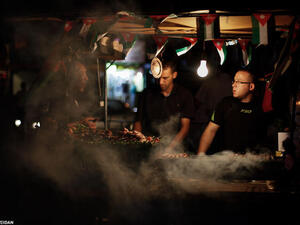 Jordanians enjoying grilled meat and time with friends through the lens of Amer Sweidan.