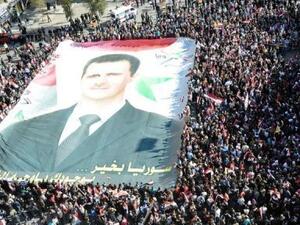 متظاهرون مؤيدون للرئيس السوري بشار الاسد
