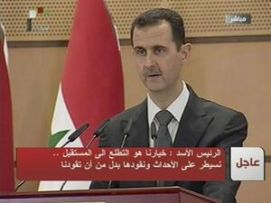 الأسد يتحدث للشعب السوري في دمشق يوم الاثنين. صورة من التلفزيون السوري
