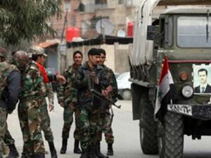 Syrian army forces, who are loyal to President Assad, who are those believed to have perpetrated the recent attacks in the west of Syria. Image for illustrative purposes. 