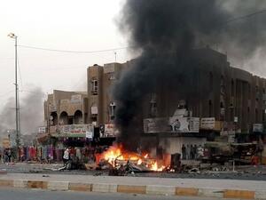 نيران تندلع في موقع انفجار في بغداد الاثنين