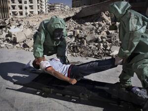 Volunteers take part in a simulation of how to respond to a chemical attack, in the northern Syrian city of Aleppo on September 15, 2013. Saudi Arabia on Tuesday said the use of chemical agents should not be allowed to 'minimise' the Syrian crisis. (AFP)
