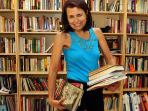 51-year-old Dubai resident Cyntha Gonzalez borrowed a book for 33 years. (Image: Gulf News)