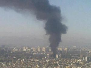 ارشيف/ عمود دخان يتصاعد فوق دمشق 