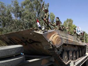 دبابة للجيش السوري في دير الزور