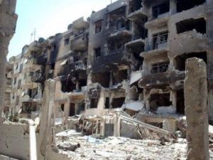 من صور الدمار الناجم عن القصف العنيف من قبل القوات النظامية