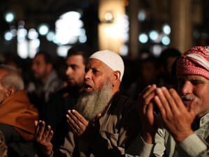 18 Saudi preachers have been detained for mentioning Egypt and Syria in their sermons. Egyptian men attend weekly Friday prayers at Al-Azhar Mosque in Cairo. [AFP]