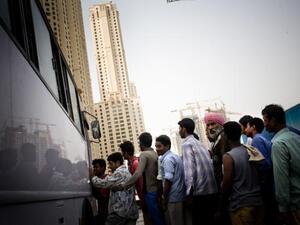 Workers wait in line to receive exit stamp from KSA authorities during amnesty period of deportation. [AFP]