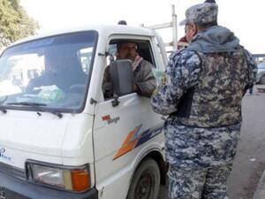 بدانة رجال الشرطة والجيش في العراق