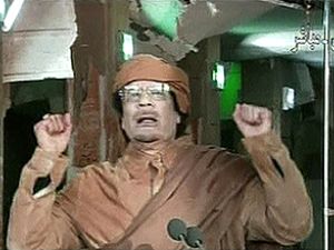 A defiant Col Muammar Gaddafi evaded capture for the first weekend as a reward of two million Libyan dinars offered for the fugitive Libyan leader, dead or alive.