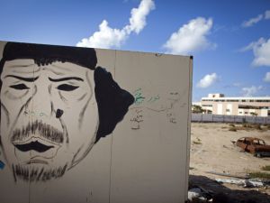 Gaddafi lives on in mocking graffiti images.