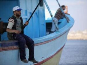 Gaza fishermen test their new freedom after the ceasefire allows them to set sail up to six miles from shore. (Christopher Furlong/Getty Images)