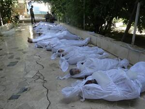 According to the Syrian Observatory for Human Rights, more than 110,000 have died in Syria since 2011. Here, the bodies of citizens (many of them young children) killed in an apparent chemical weapons attack are lined up in eastern Ghouta, on the outskirts of Damascus on August 21, 2013. (AFP)