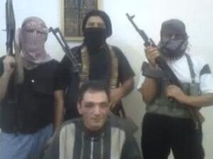 Hassan Salim al-Miqdad arrested by the FSA in Syria