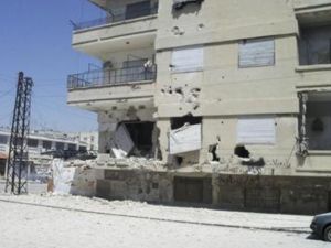 مبنى عليه اثار اطلاق نار بمنطقة القصور في حمص
