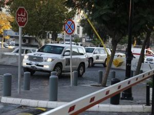 فريق مفتشي الاسلحة الكيماوية التابع للامم المتحدة في طريق عودته لفندق في دمشق