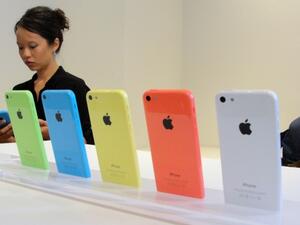 The new lower-cost iPhone 5C is available in a wide range of colours. It will be available in the Middle East in October. (AFP)