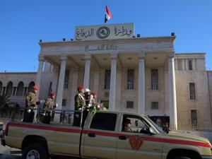 Officials held a funeral procession on Sunday for Mohammed Al Karoui, one of the soldiers who was killed in the Anbar operation Saturday (STR/AFP)