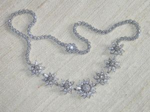 Suzanne surrenders stolen stash.