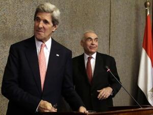 US Secretary of State John Kerry (L) and Egyptian Foreign Minister Mohammed Kamel Amr leave after a news conference at the Ministry of Foreign Affairs in Cairo on Saturday (Photo: AFP / Pool / Jacquelyn Martin).