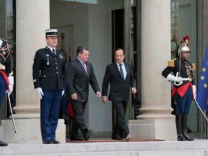 الرئيس الفرنسي فرنسوا هولاند والعاهل الاردني الملك عبد الله الثاني 