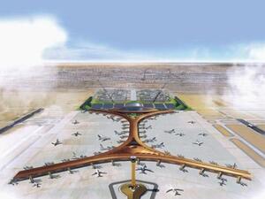 The four new crescent-shaped passenger halls will be located to the south of the current international terminal as seen above. Some see these four protruding arms as a woman lain out in anticipation for penetration by this ready 'tower'.