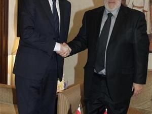 راخوي (الى اليسار) ونظيره المغربي عبد الاله بن كيران في الرباط 
