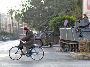 The war in Syria has spilled over into Lebanon, heightening sectarian tension and violence particularly within the northern city of Tripoli (Ibrahim Chalhoub/AFP)