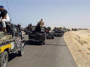 ثوار ليبيون في الطريق إلى سرت 
