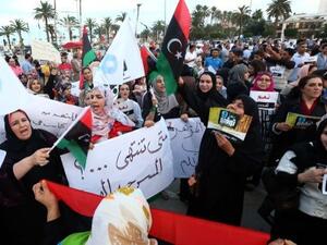 Protestors gathered in Tripoli's Martys' Square Saturday in opposition of calls to renew GNC's mandate, saying that an extension will only "push Libya into further turmoil" (Mahmud Turkia/AFP)