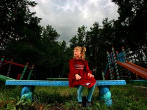 Playground play- otherwise assumed to be innocent and harmonious- is often a stressful time for children who experience
 bullying or segregation or discrimination.  This can be drawn from applied behaviors from the home and parents.