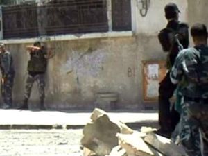 ارشيف/ جنود سوريون خلال اشتباكات في حي الميدان في دمشق