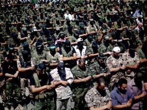 عرض عسكري للفصائل بغزة ضد المفاوضات مع اسرائيل