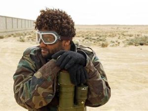 مقاتل من المعارضة في اجدابيا يوم الثلاثاء
