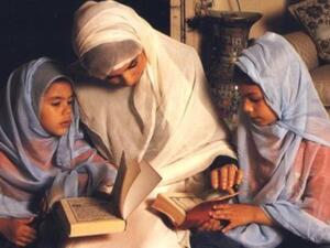 Muslim families reading and reciting the holy Quran
