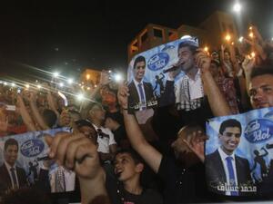 احتفالات في شوارع نابلس في الضفة الغربية عقب اعلان فوز عساف بلقب اراب ايدول