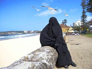 Burqa on the beach