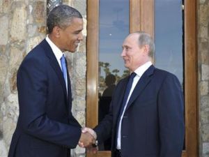 بوتين يصافح اوباما