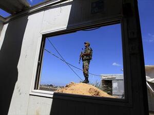 A Hamas policeman stands guard along the border with Egypt and the Palestinian territory on September 8, 2013 in the southern Gaza Strip city of Rafah. The Egyptian army has launched a major offensive against militants in the area. (AFP)