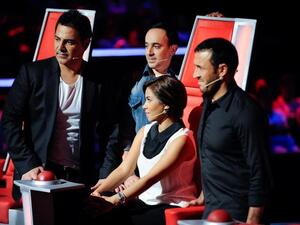 The competition heats up between the four coaches as they continue their search for 'The Voice'