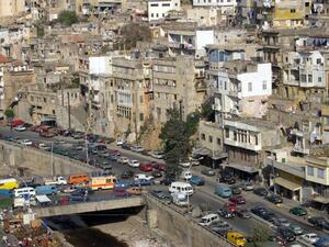 Rival neighborhoods Bab al Tabbaneh and Jabal Mohsen have fought since the Lebanese civil war. (AFP/File)