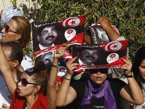 Tunisians protest after the death of Mohammad Brahimi last week. (AFP)