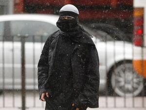 Women in full burqa would be contravening the law in Belgium