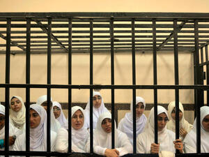 Fourteen women and seven girls were sentenced to heavy jail terms due to their alleged ties to the Muslim Brotherhood and participation in a violent October protest (AP)


