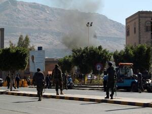 Smoke rises from the suicide bomb attack on Yemen's Defense Ministry Thursday (Mohammed Huwais/AFP)